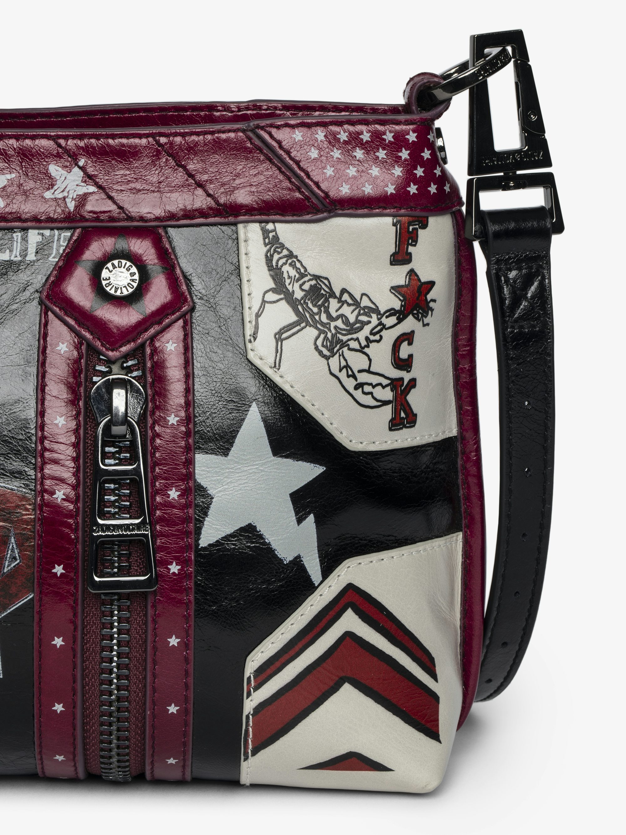 Sunny Moody Punk Bag - Vintage-inspired patent leather bag with adjustable shoulder strap and wing signature.